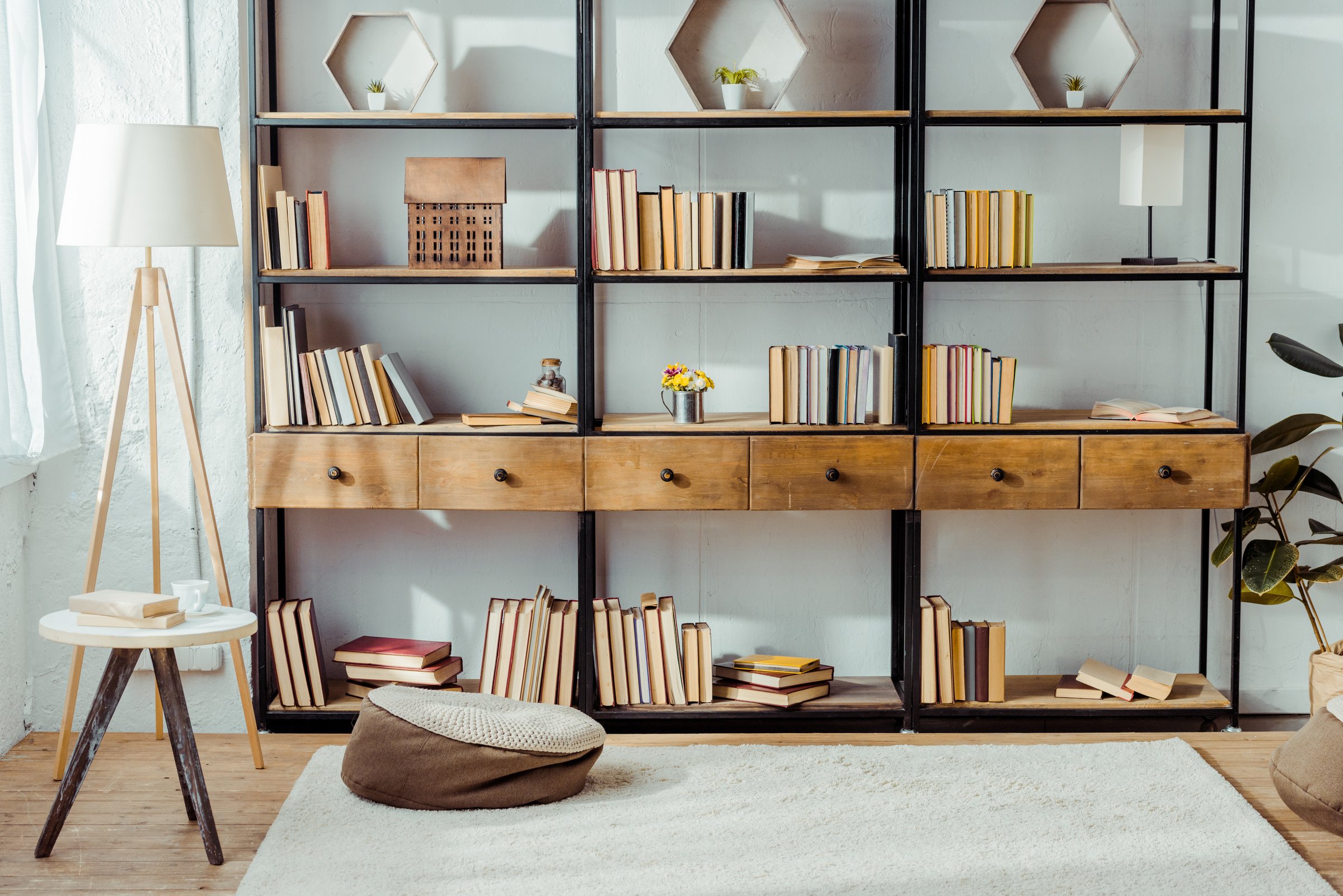 interior of living room with wooden furniture and books