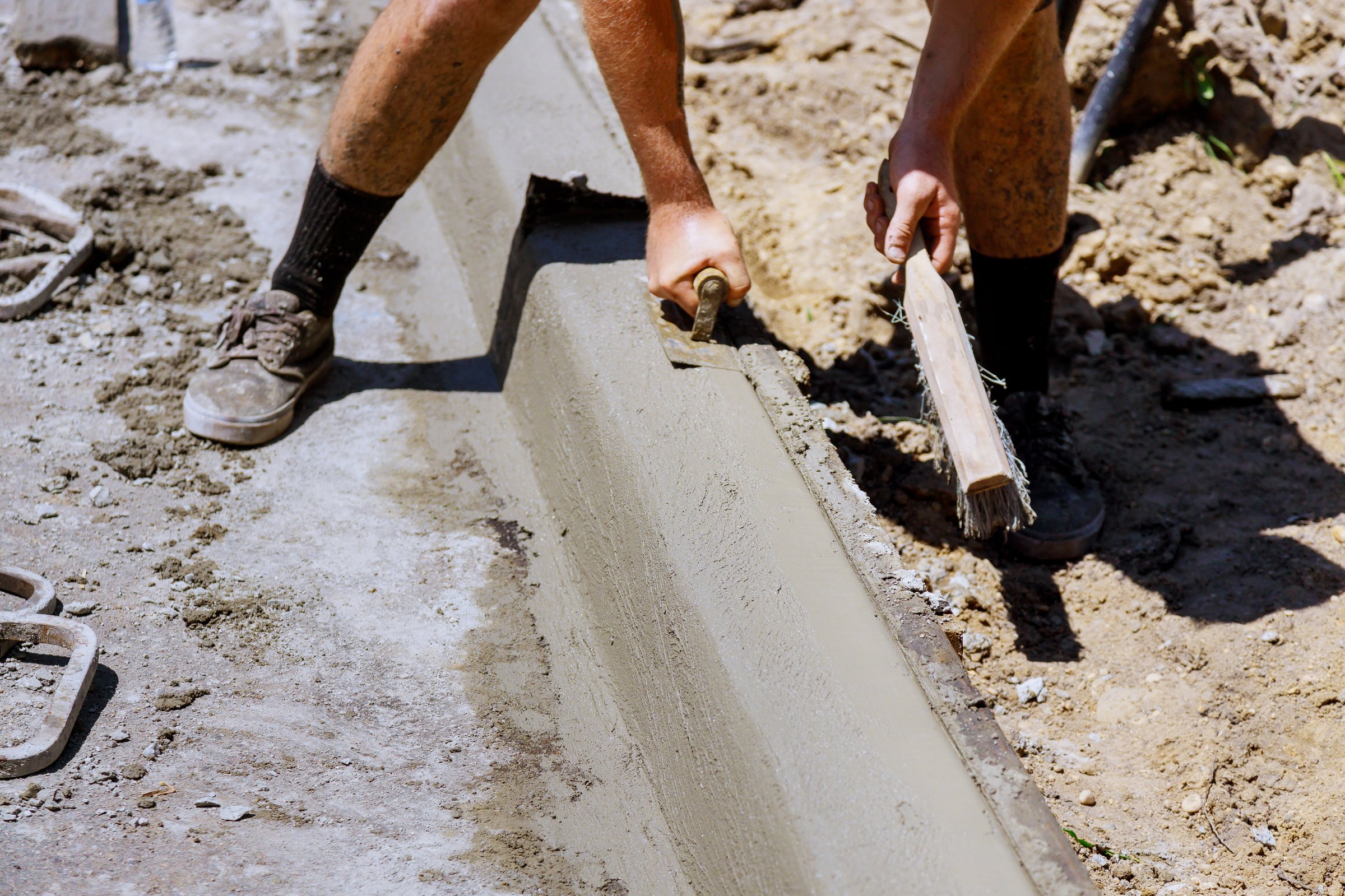 Installation of concrete curb for a convenient pedestrian crossing, reconstruction of the sidewalk