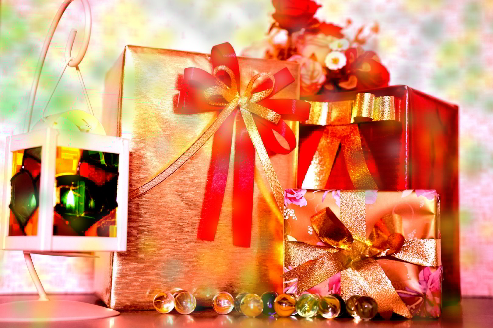 christmas and new year gift box with gold light background and bokeh