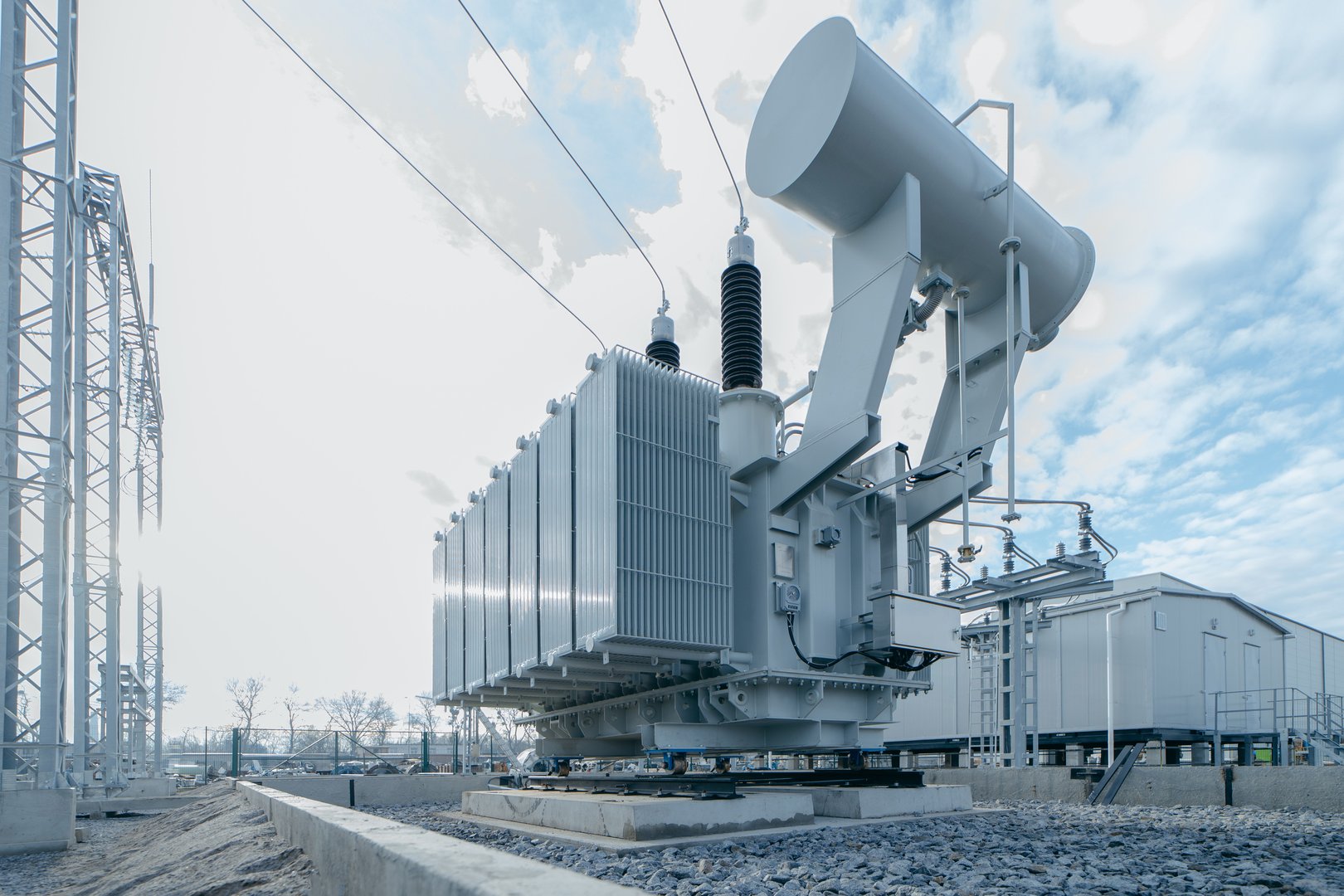 Modern new power station. The equipment used to raise or lower voltage, high voltage power station. Electrical Transformer