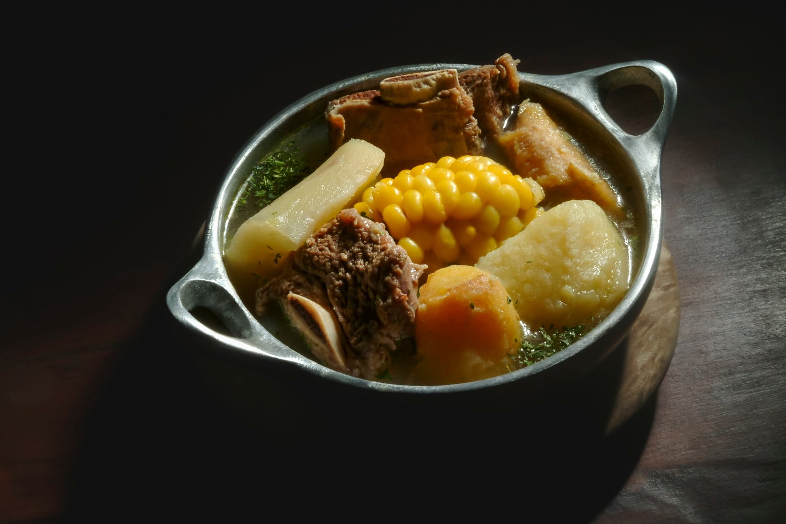 Sancocho, typical dish from Colombia, Bogota, soup, meat, vegetables, corn, banana