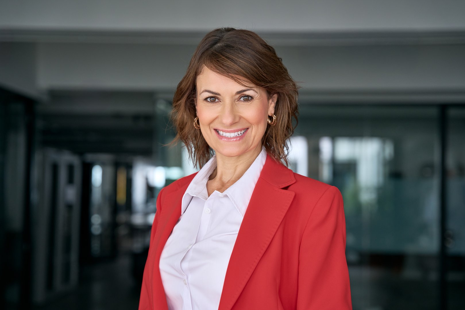 Headshot close up portrait of latin hispanic confident mature good looking middle age leader