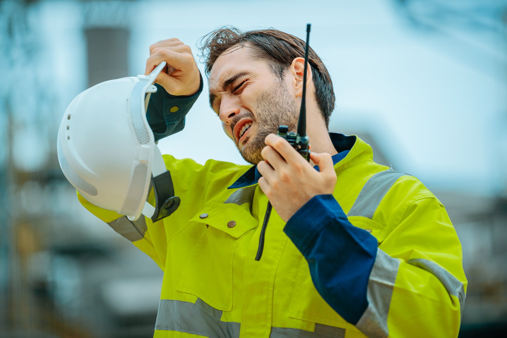 Portrait of exhausted man at construction site