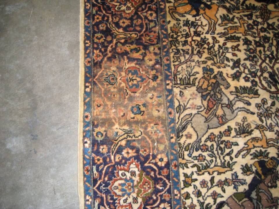 Before: Worn Oriental rug with faded pattern and pile damage from years of use