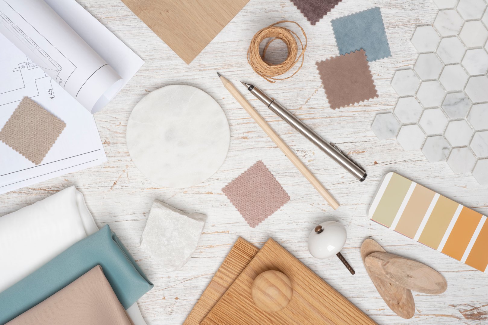Creative table top view of furniture or interior designer with various samples and tools