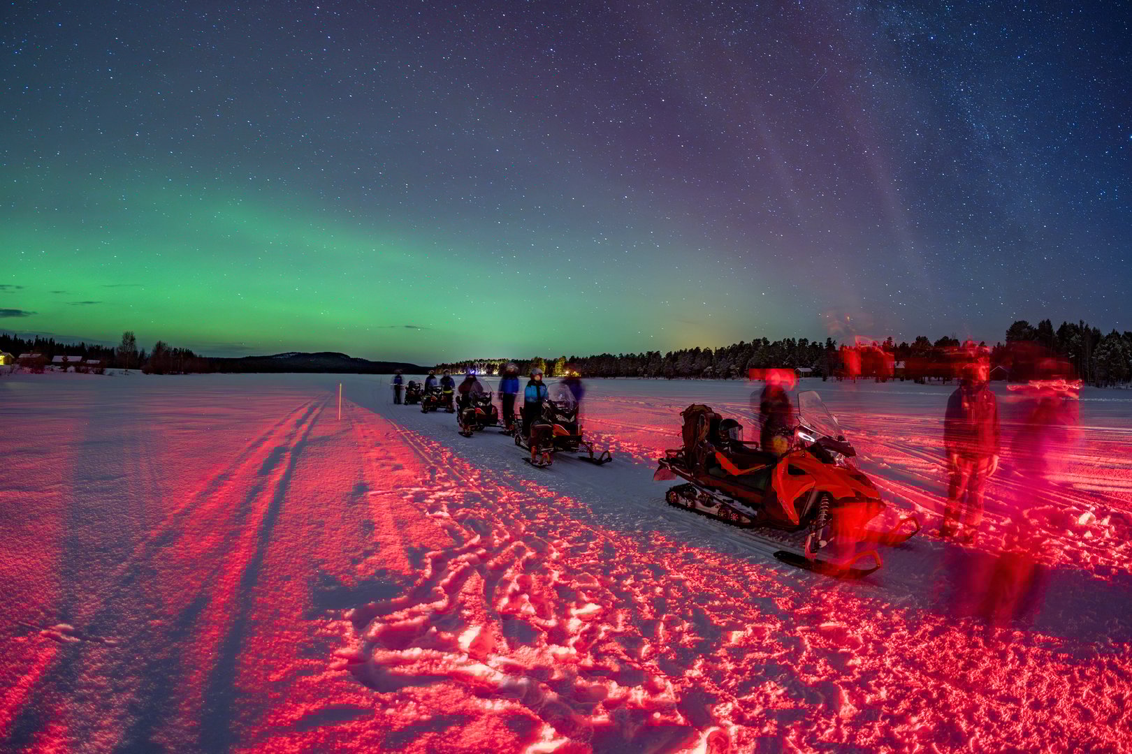 Snowmobile expedition Aurora Wonderful Northern Lights in Lapland Inari Nellin Lake forest
