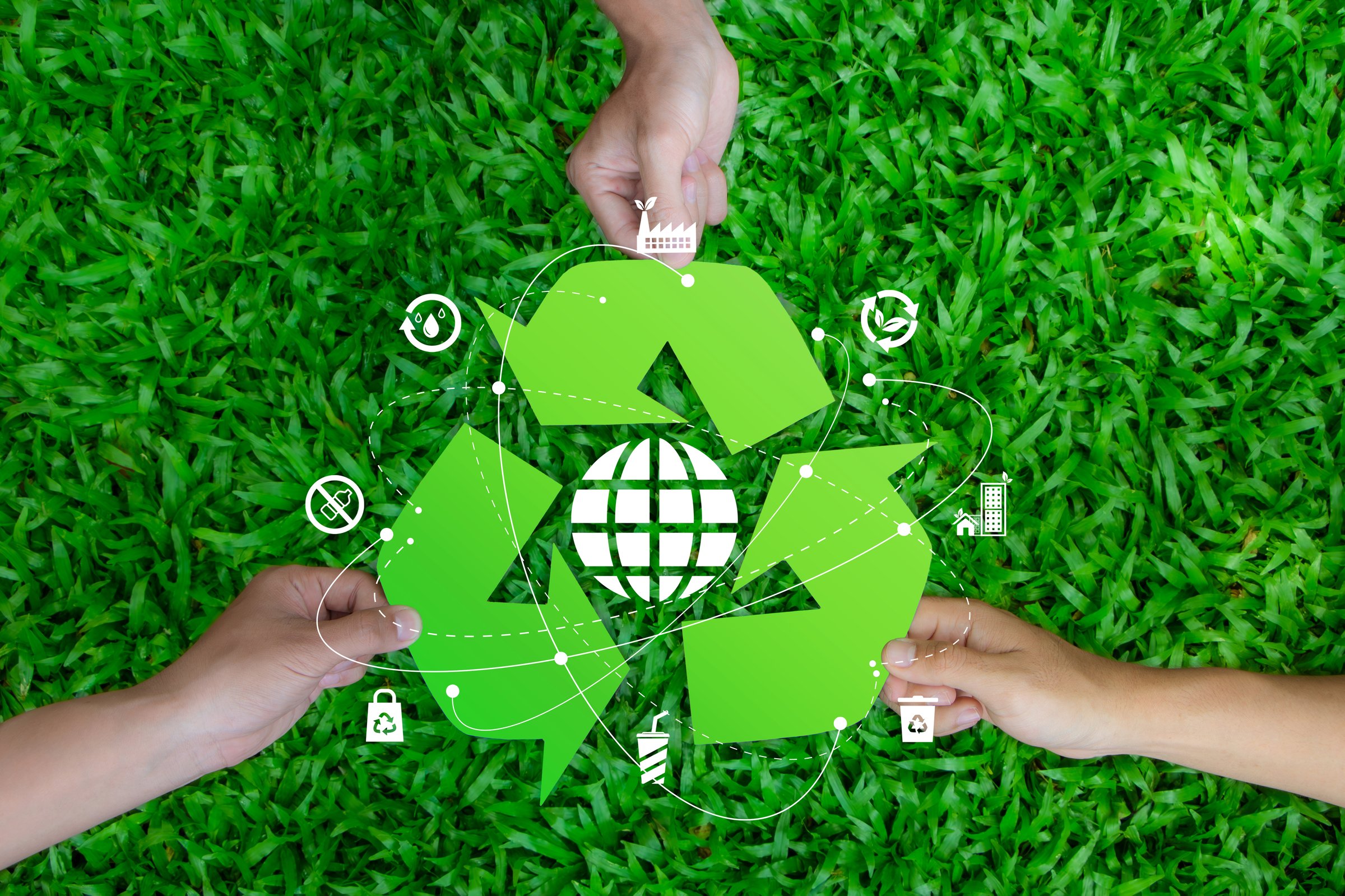 Zero waste concept. The picture shows three hands holding a green recycling symbol with a globe in the center with icon. Reuse Reduce Recycle. CSR. Environmental sustainability. volunteer, Unity. ESG.