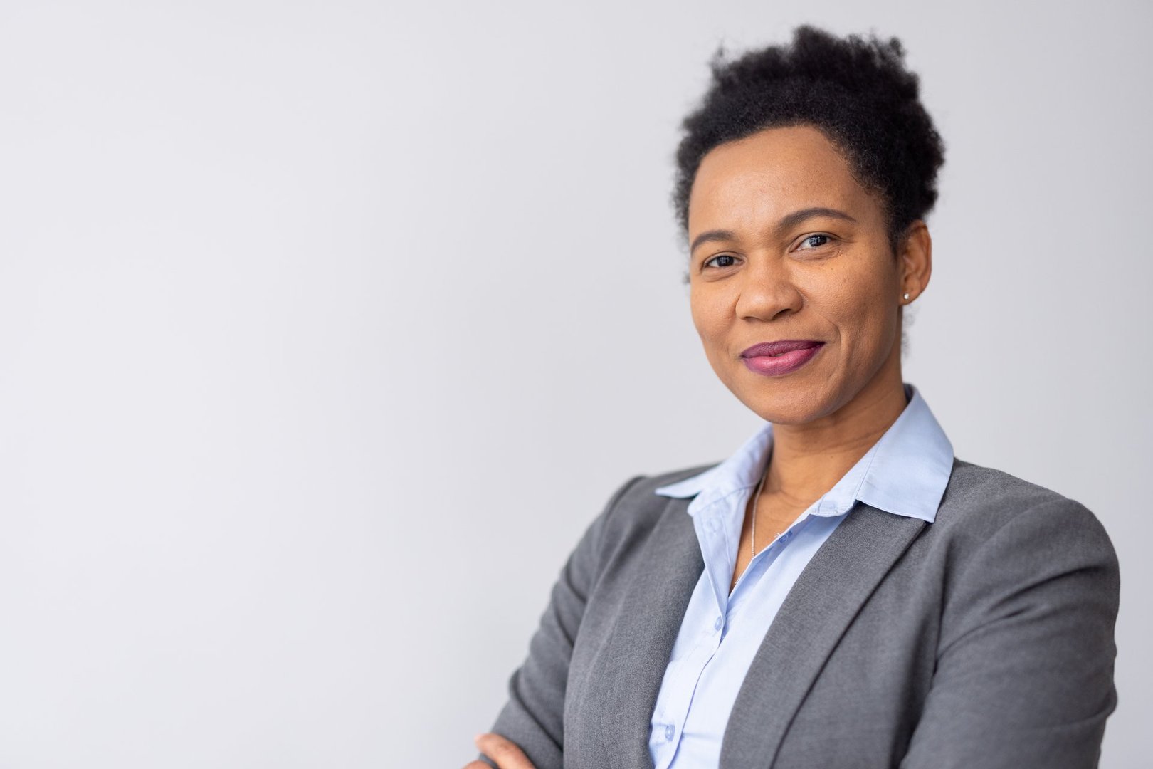 Elegant African American business leader in a stylish outfit - sugarfree.space corporate stress resilience