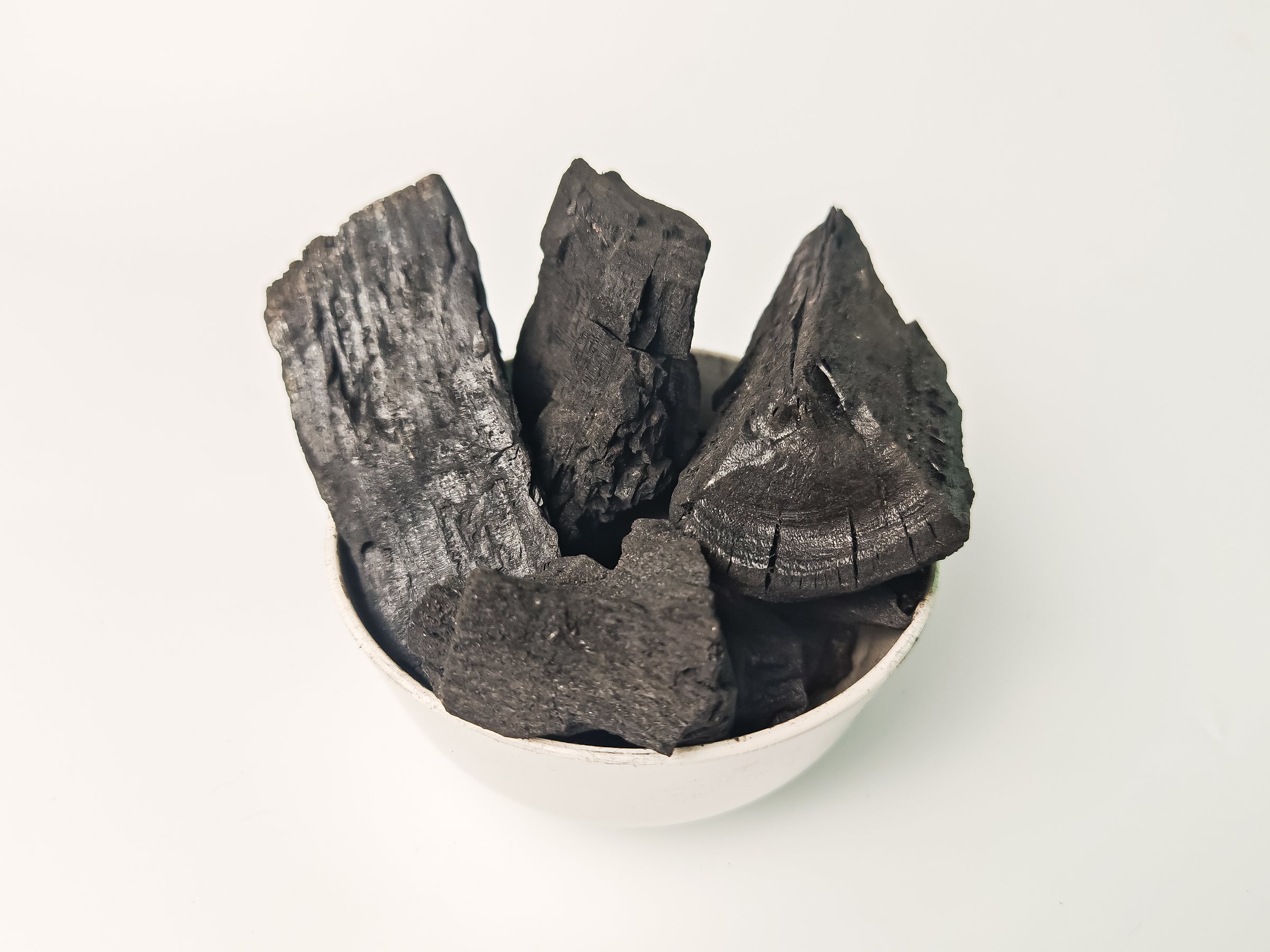 Texas Mesquite Charcoal in white bowl