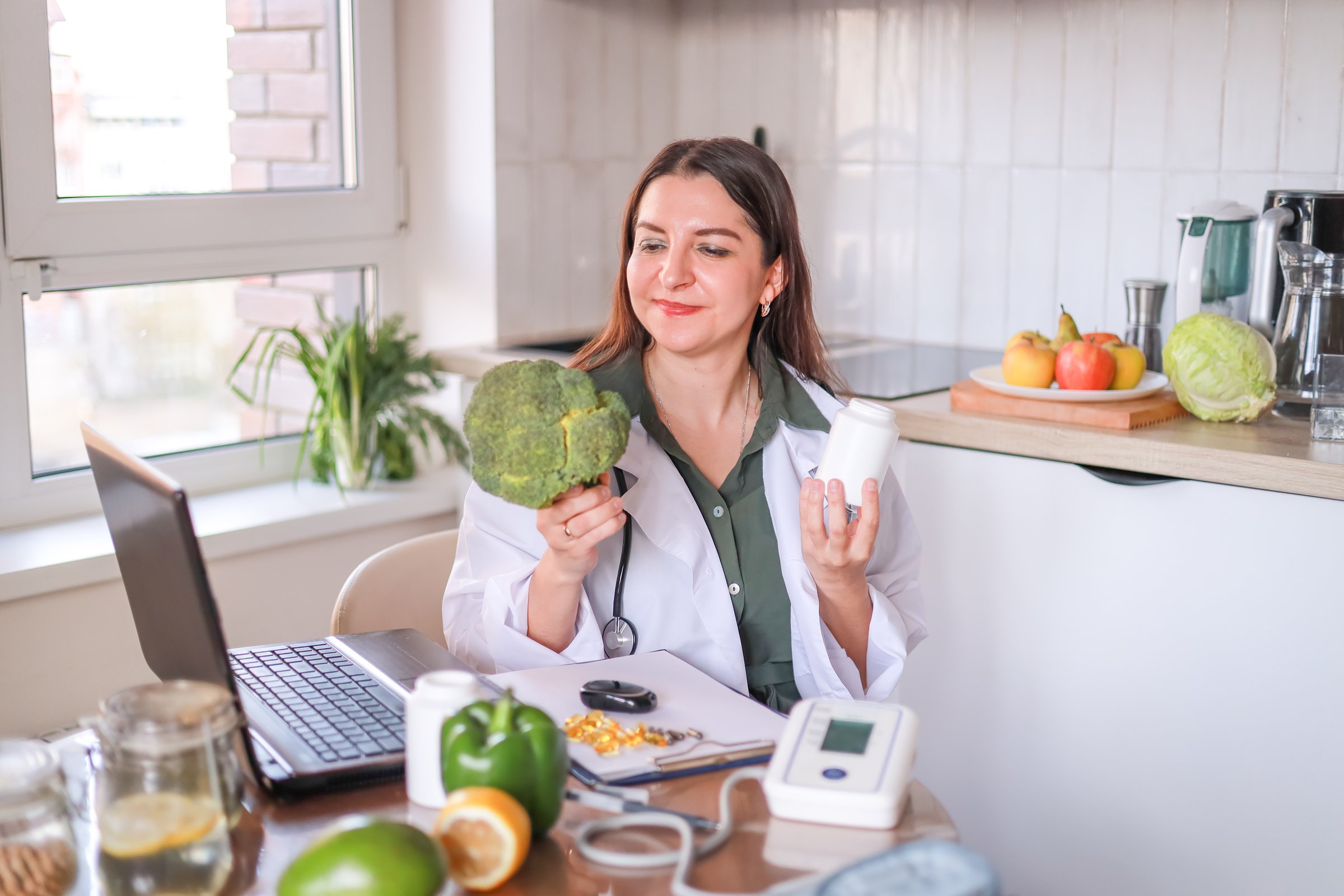 nutritionist discusses broccoli as a source of vitamins and minerals for women's health. health and nutrition concept.