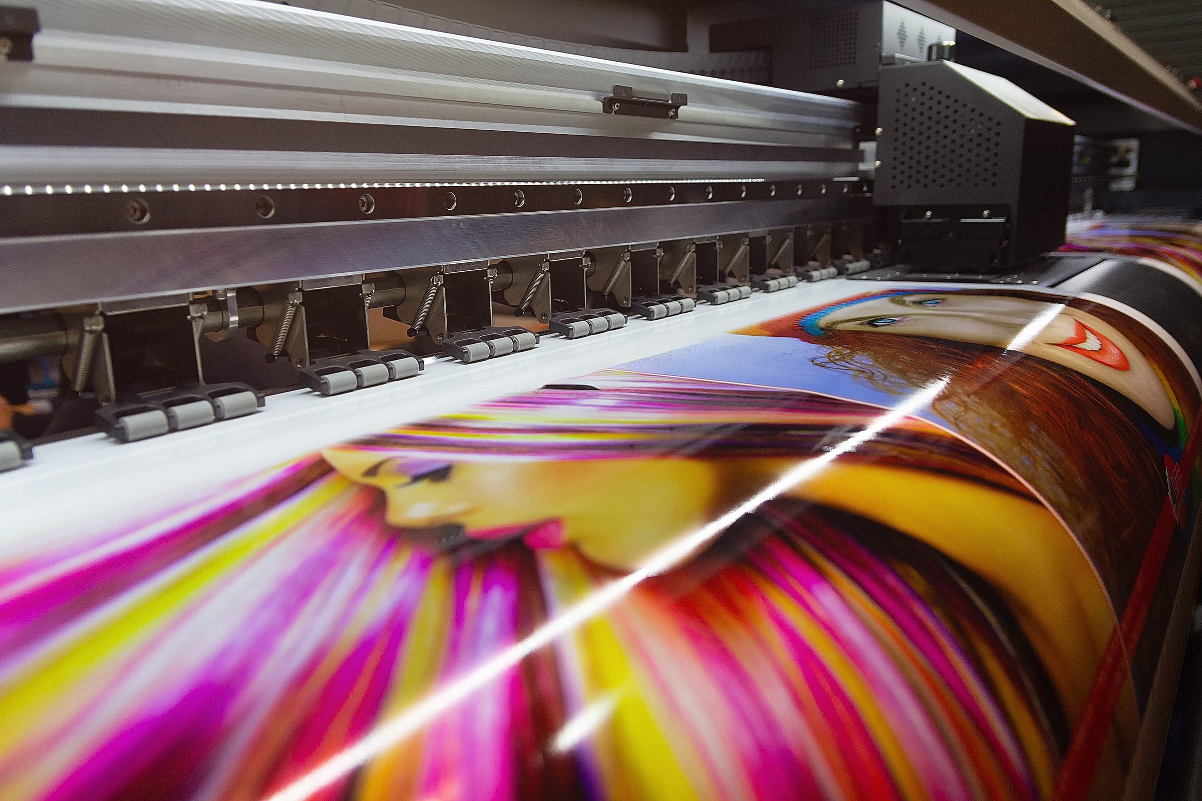 Large format printing machine in operation. Industry