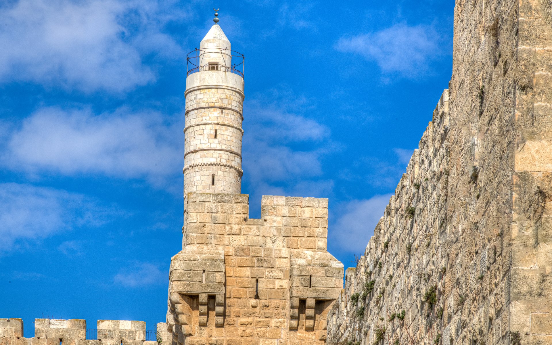 Historic tower featuring a cylindrical, stone structure
