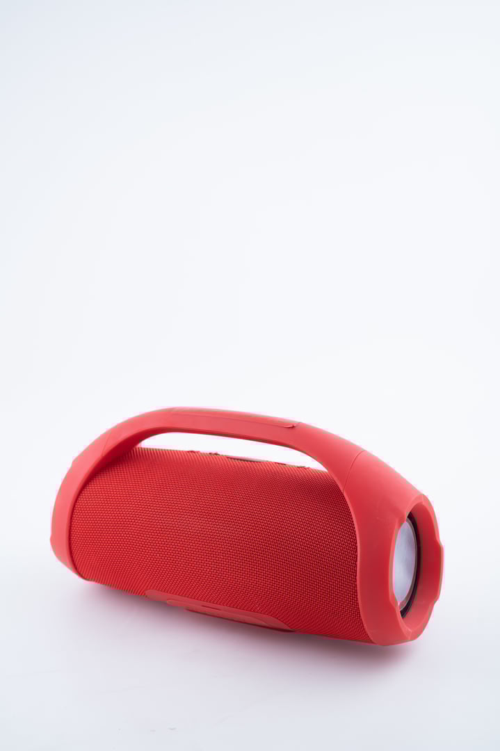 This compact red wireless Bluetooth speaker offers high quality sound and portability, perfect for outdoor use.
