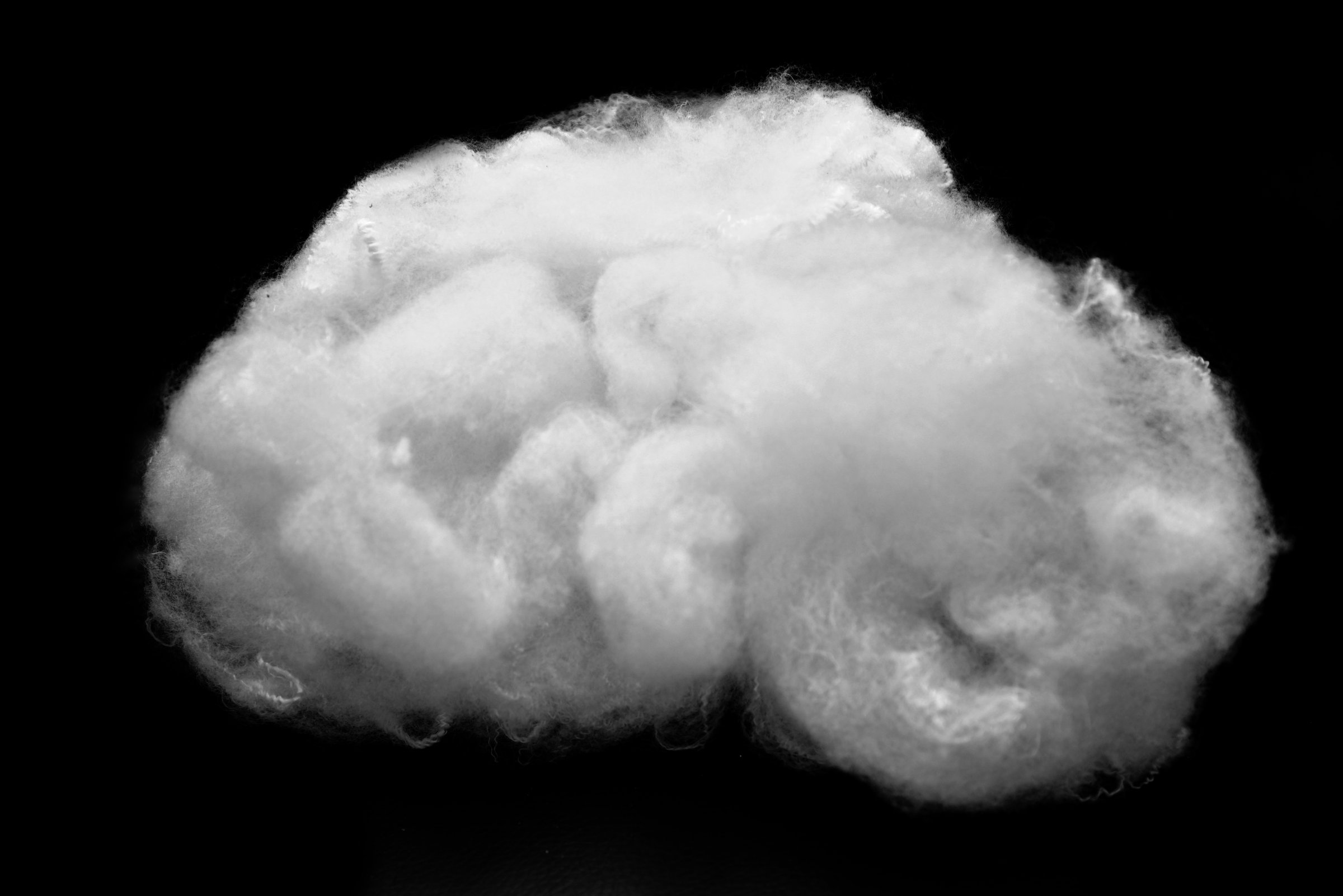 White fluffy cloud isolated on black background