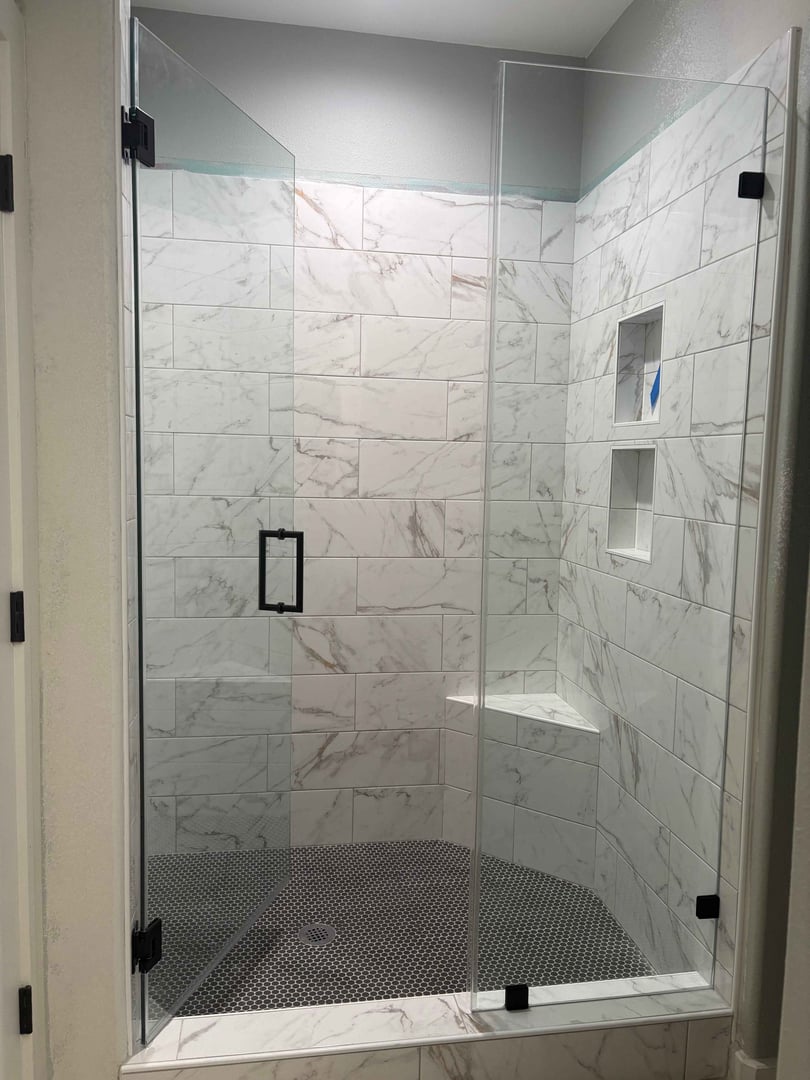 Shower before renovation in Montgomery