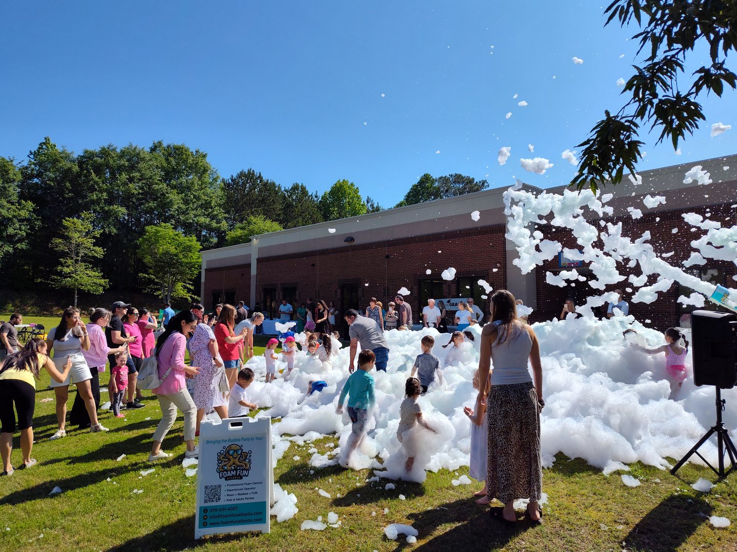 Happy kids at foam party celebration
