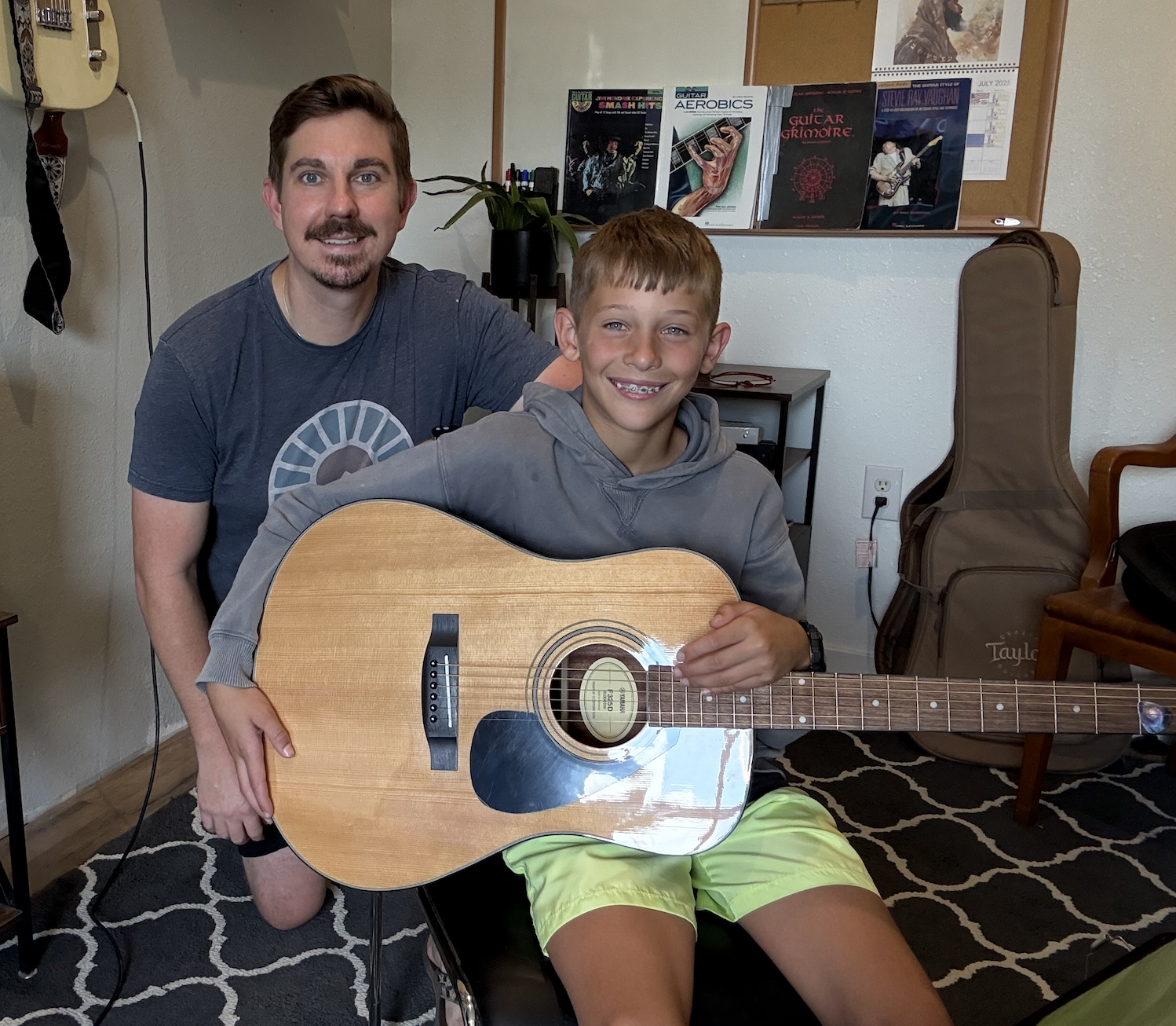 Teaching guitar student