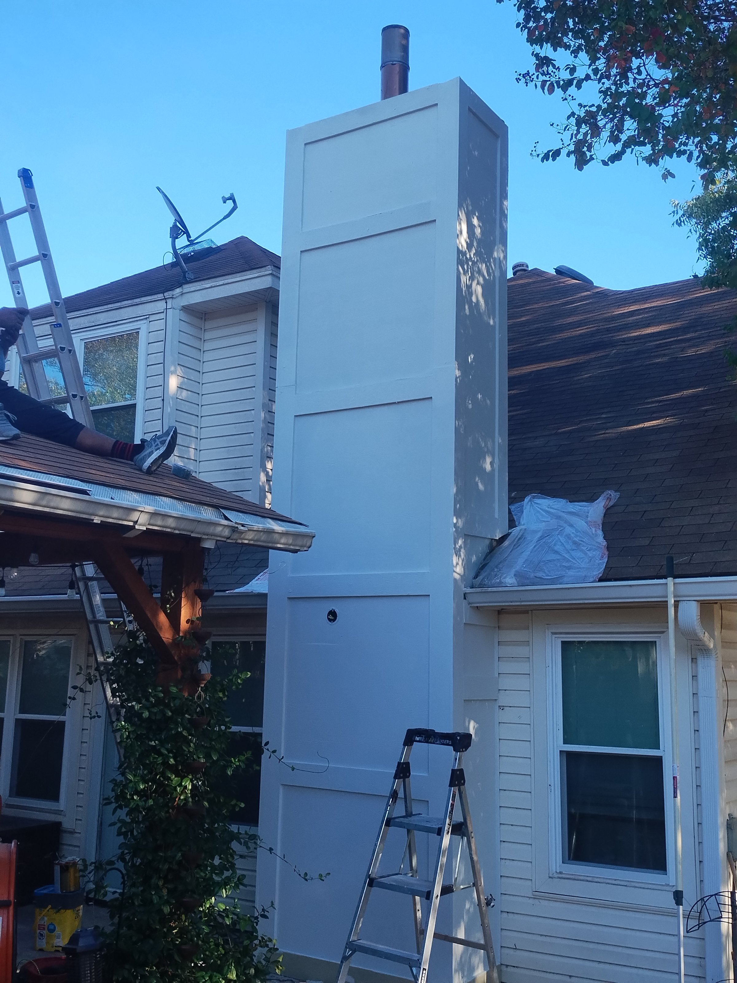 Professional chimney cleaning work showing before and after results