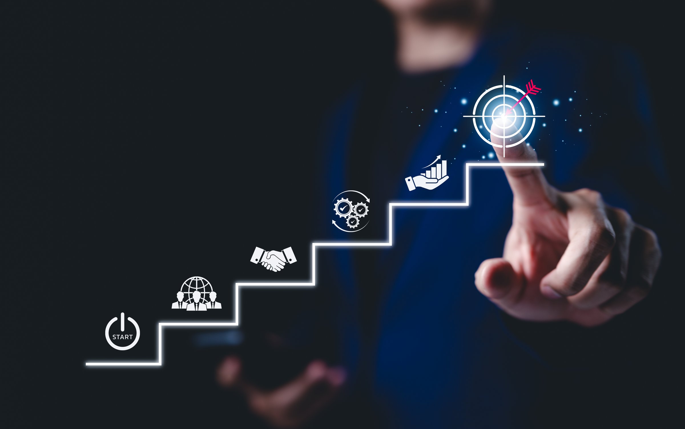 Business Growth and Success Strategy Concept. Businessman points at target icon at top of staircase, step-by-step strategy, and achieving goals. goal setting, strategic planning, business ventures,