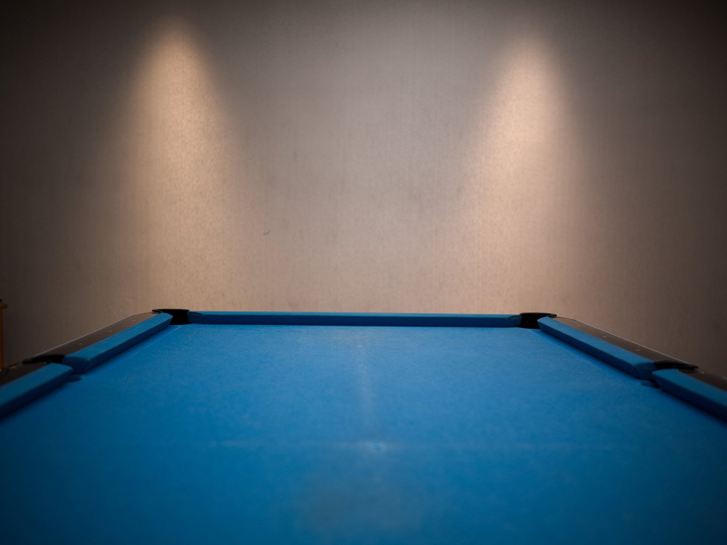 Blue Pool Table with Light Wall