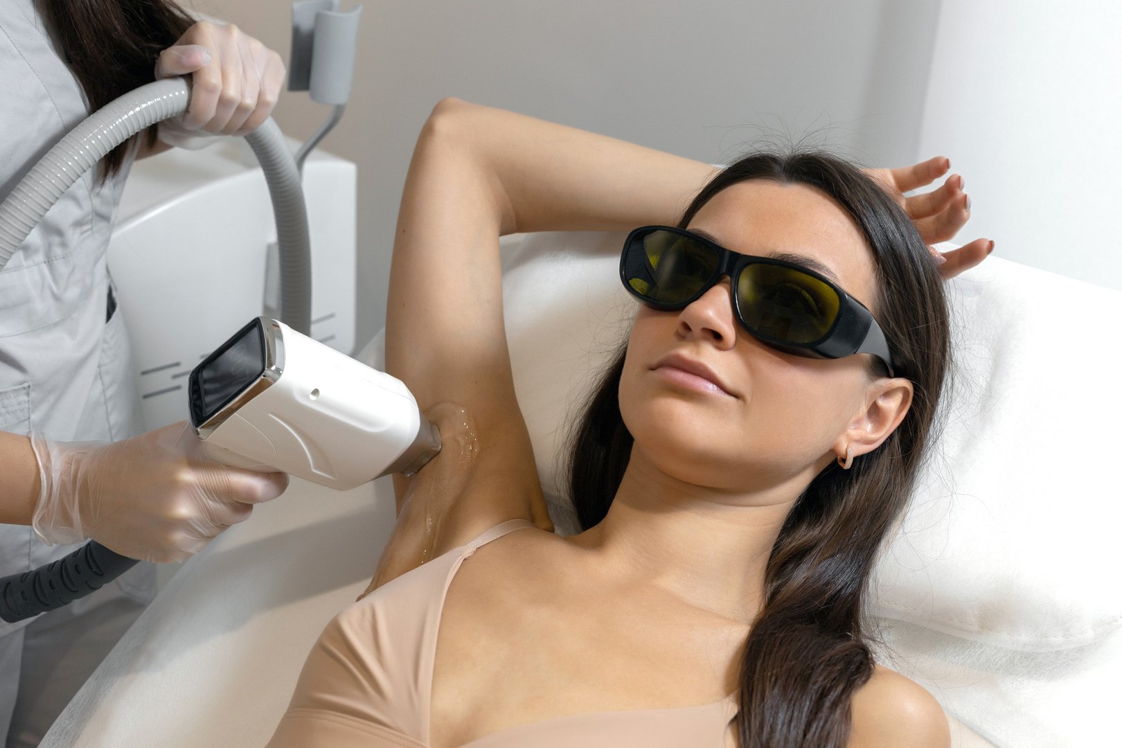 Woman is getting care treatment for skin and body in beauty clinic