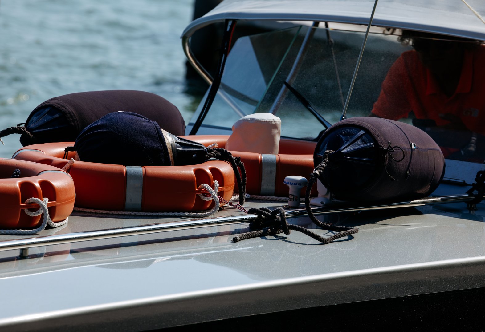 Burano, Italy - June 25, 2025: Close-up of safety gear on luxury yacht, including life rings and fenders, emphasizing marine safety and lifestyle