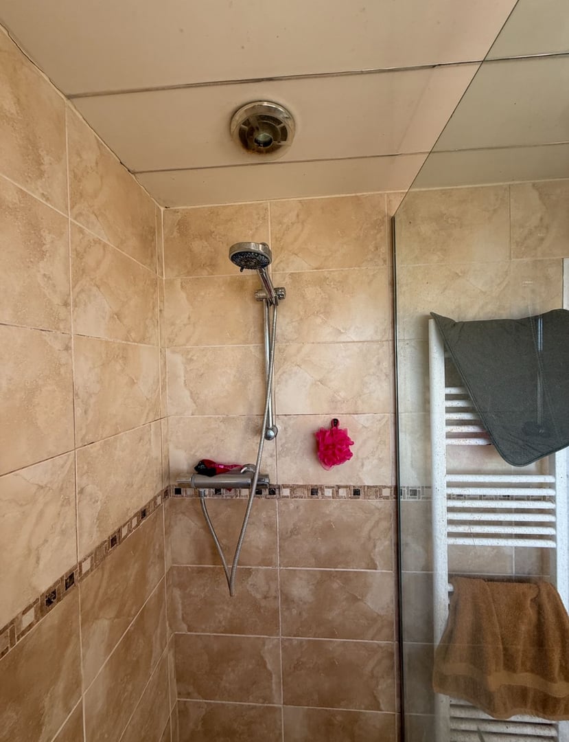 Bathroom before renovation by Yorkshire Green Heating
