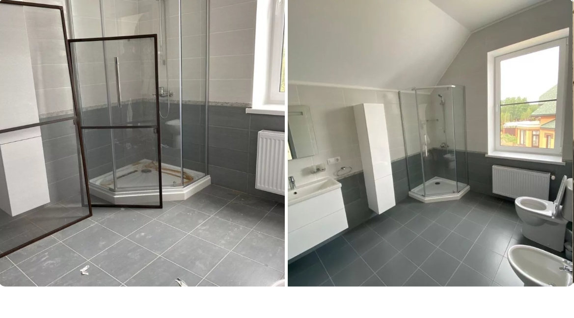 Modern bathroom with a glass-enclosed shower, gray tile flooring, a window, and white fixtures.