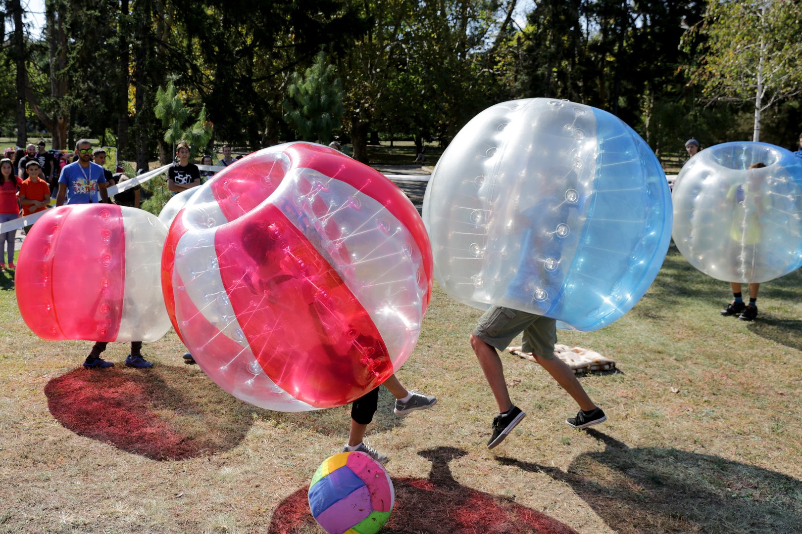Sofia, Bulgaria - September 24, 2016: Boys are playing bubble football game in the park.