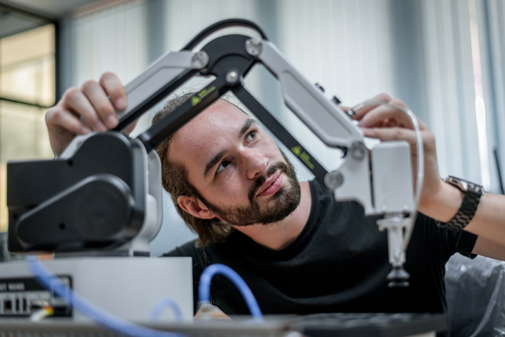 Engineer team learning and analyzed to develop automation welding robot machine is artificial intelligent industrial system automate monitoring Hi-technology industry manufacture concept.