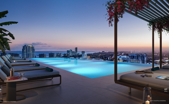 Rooftop infinity pool overlooking a city skyline at sunset, with lounge chairs and lush greenery.