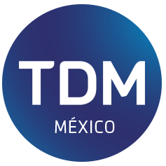 Logo featuring white letters "TDM MÉXICO" on a dark blue gradient circular background.