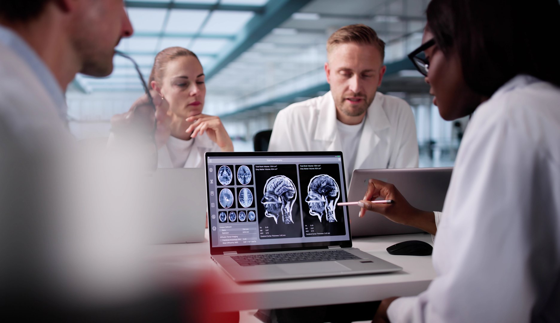 Medical team using imaging technology