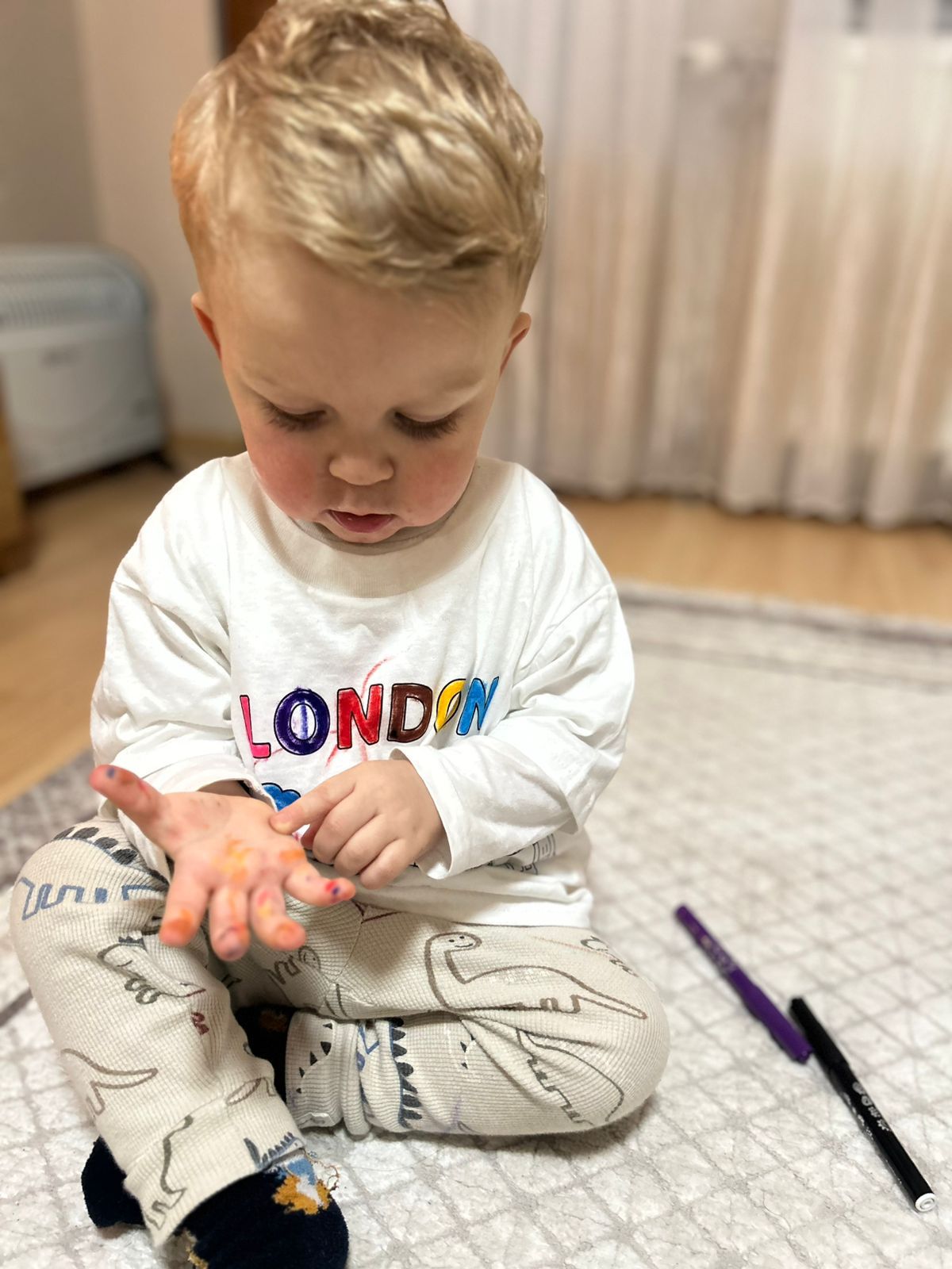Roel colouring his Colour Me London T-shirt at home