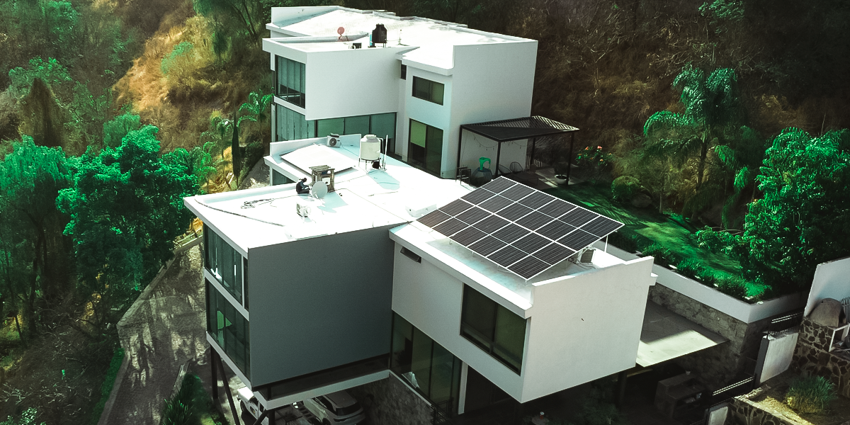 3d rendering of a modern house in the evening with electric heat pump