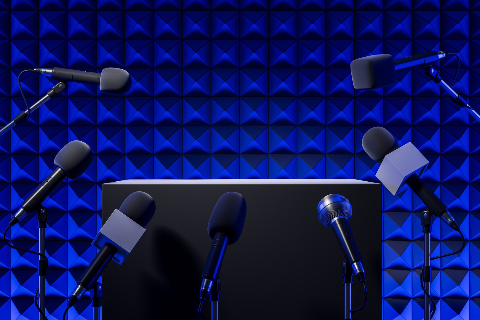 Multiple microphones arranged around a podium, set against a geometric blue acoustic panel background. Concept of media, press or public speaking. 3D Rendering