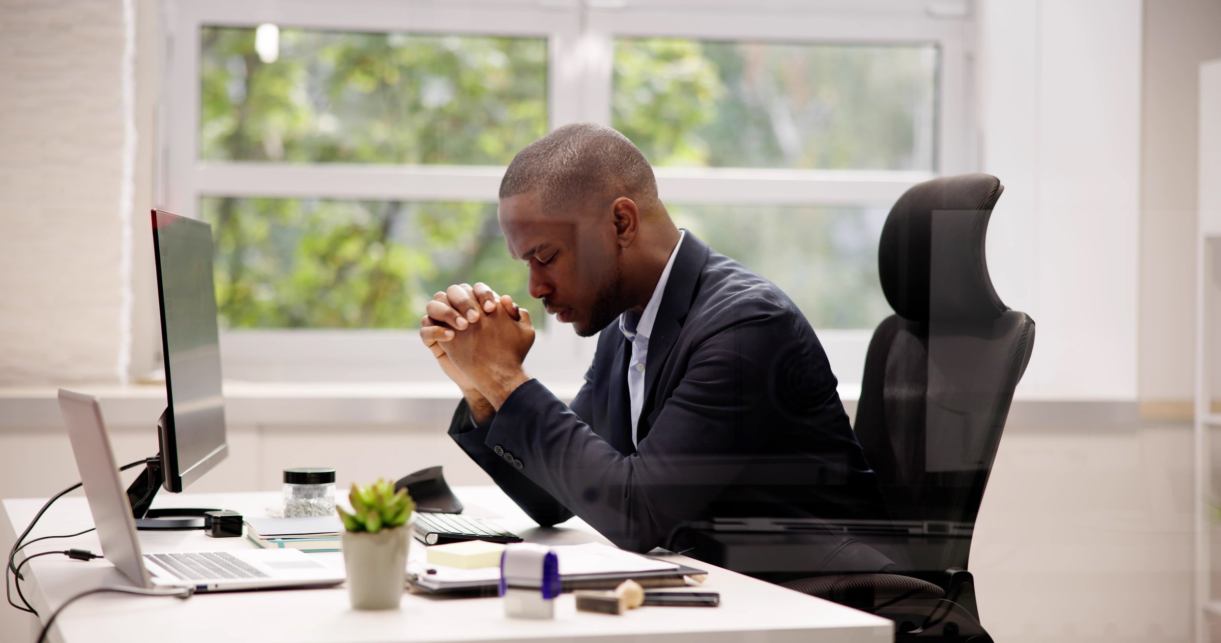 African American Man Praying. God Seeking Prayer