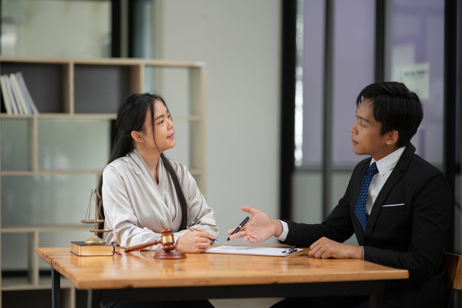 Legal lawyers work and discuss legal issues with clients.