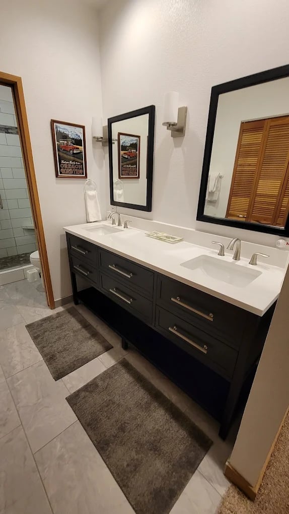 Luxury bathroom renovation with premium fixtures and tile work