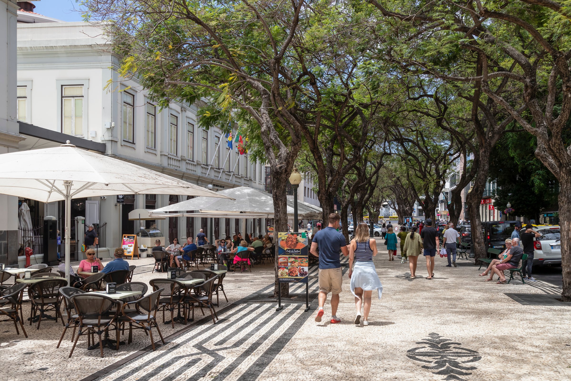 Funchal, Madeira - Portugal, June 1, 2024; People enjoy the terrace of Café Ritz Madeira, one of Funchal's oldest grand cafés.