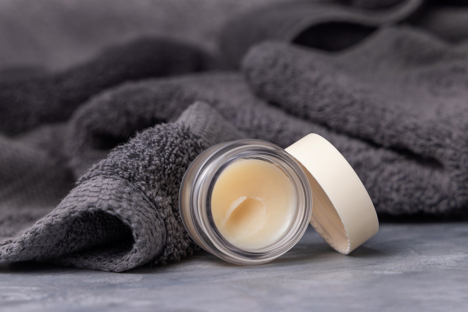 Opened lip balm jar with blank lid