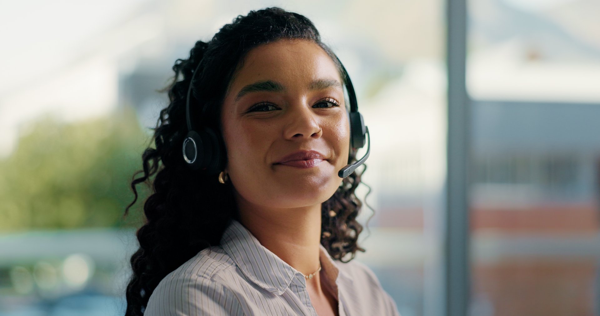 Customer service, call center and portrait of woman in office for consulting, online help and contact. Corporate, professional and happy person with headset for feedback, crm support and assistance