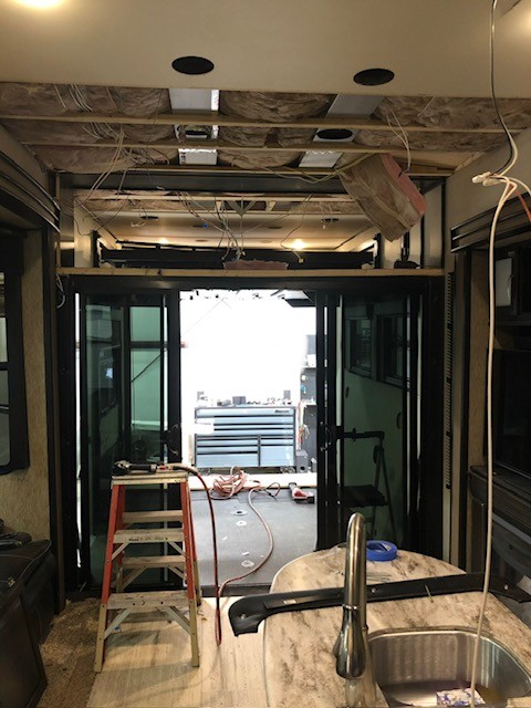 RV ceiling damaged by fallen tree