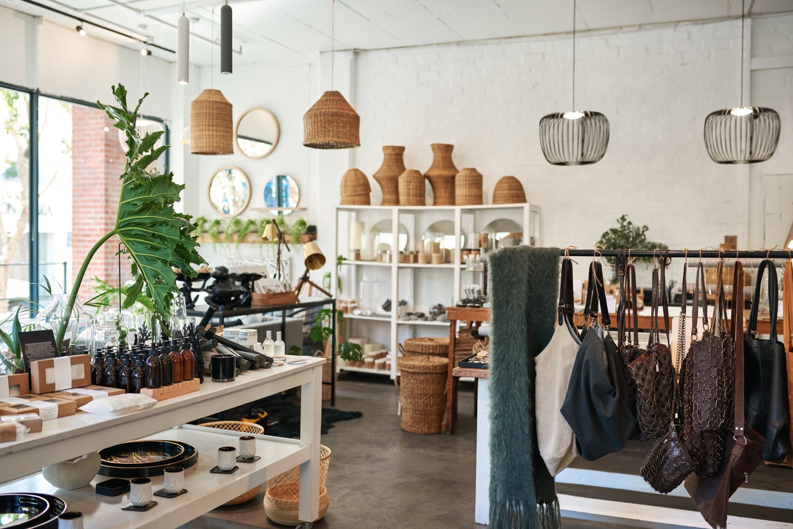 Interior of a stylish boutique full of an assortment of housewares, bags and accessories for sale
