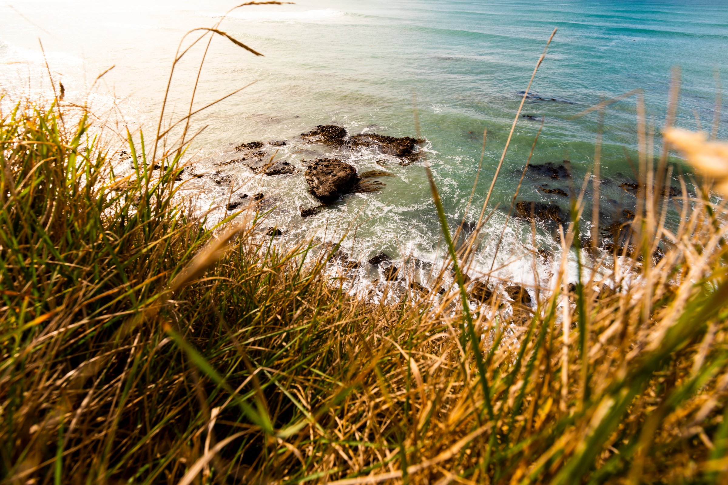 Cliffs, beach, and sea at Mitchell Rocks