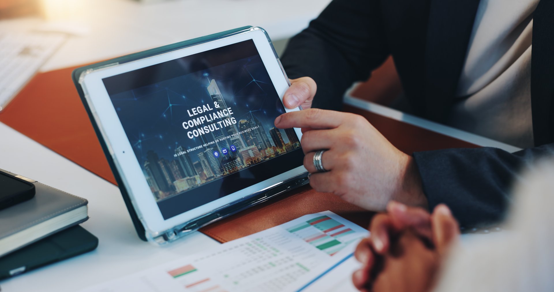 Hands, tablet screen and consultation at law firm for meeting, advice and compliance. Technology, lawyer and business people with client for legal discussion and show services on website in office