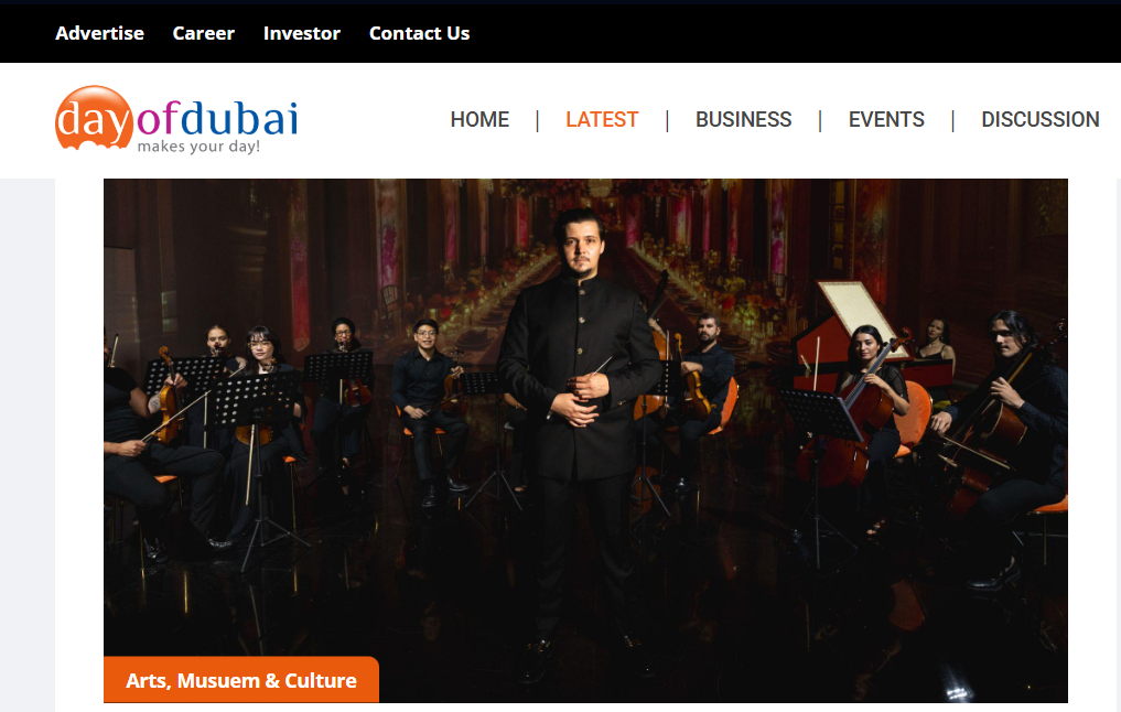 Orchestra conductor and musicians performing in an elegant hall, featured on a website's Arts, Museum & Culture section.