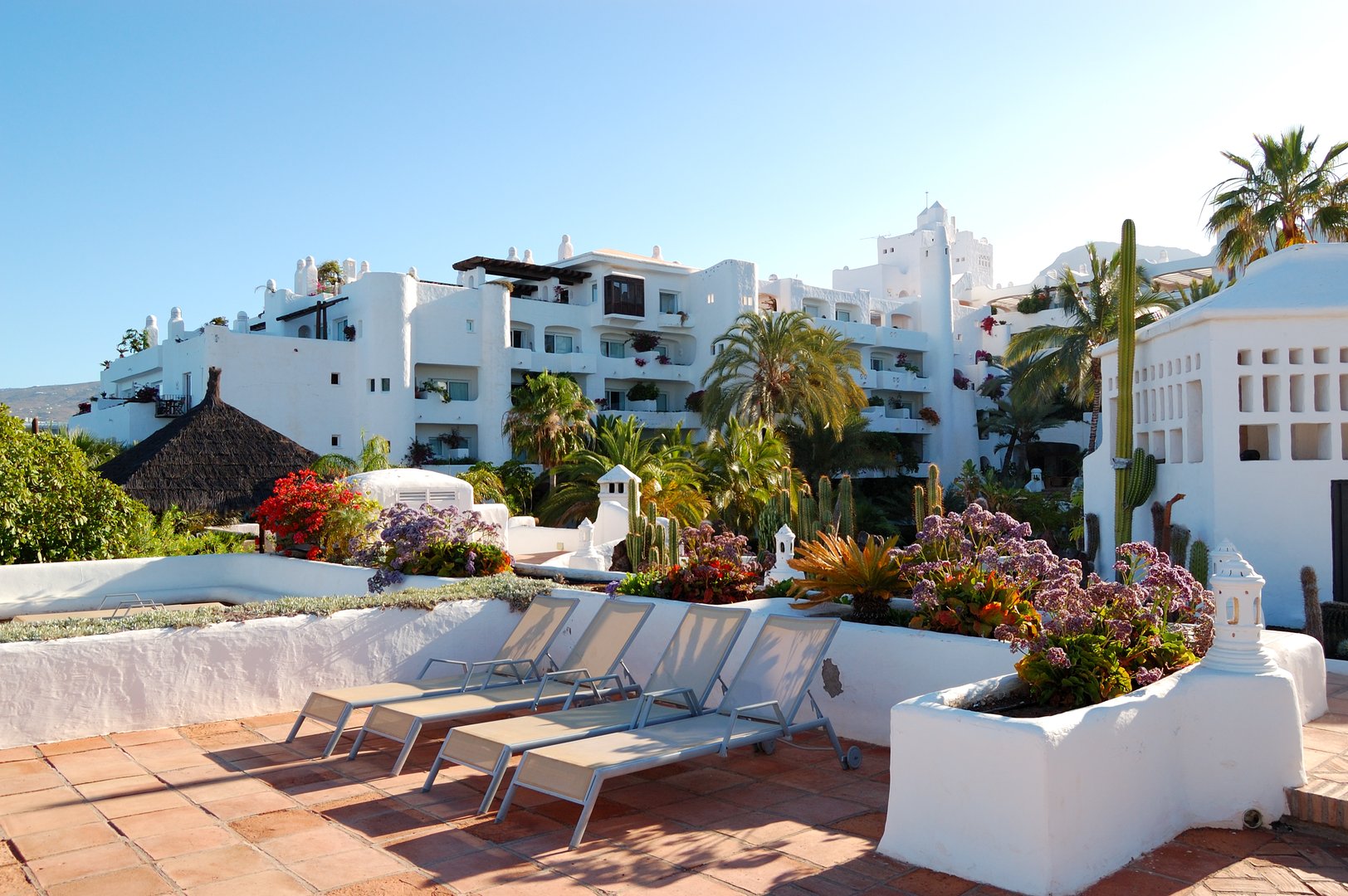 Sunbeds on sea view terrace at the luxury hotel, Tenerife island, Spain