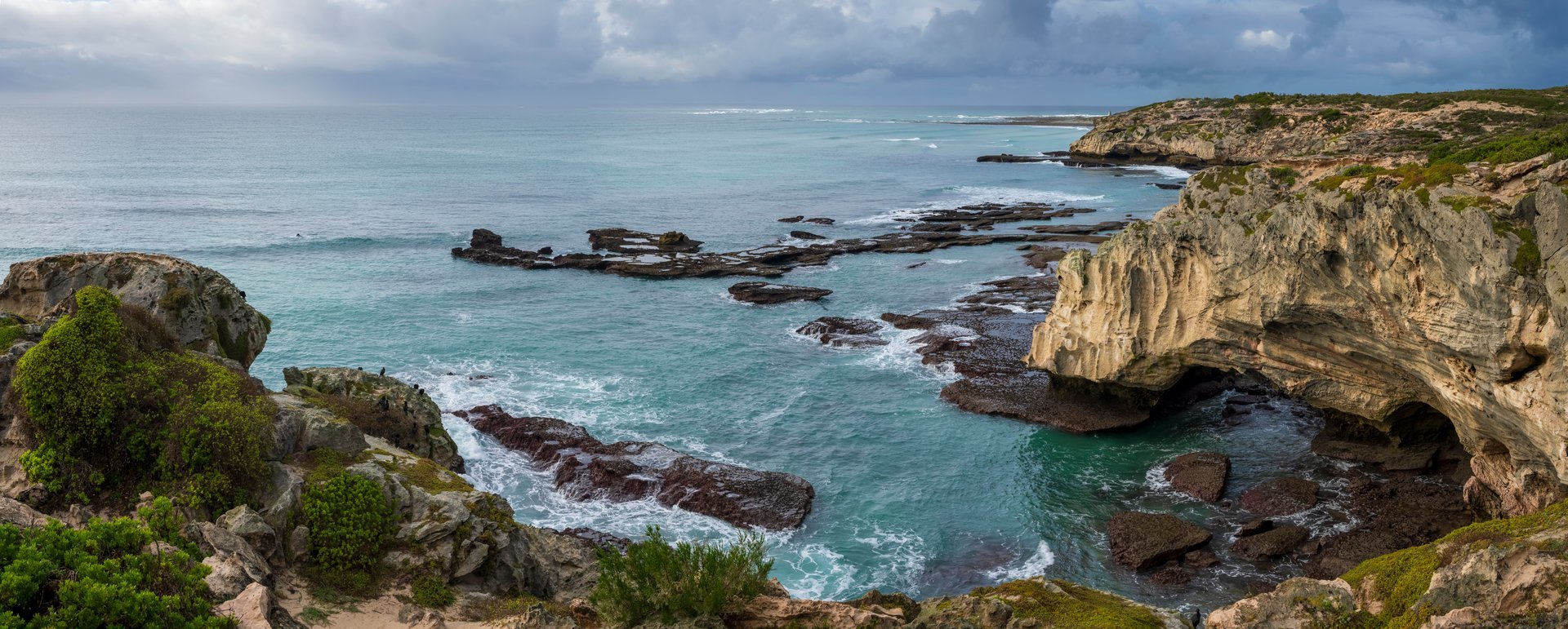 Stunning marine view of rocky coastline near Waenhuiskrans, Arniston, Overberg, Western Cape, South Africa. Dramatic cliffs, ocean waves, pristine landscape perfect for nature and travel projects.
