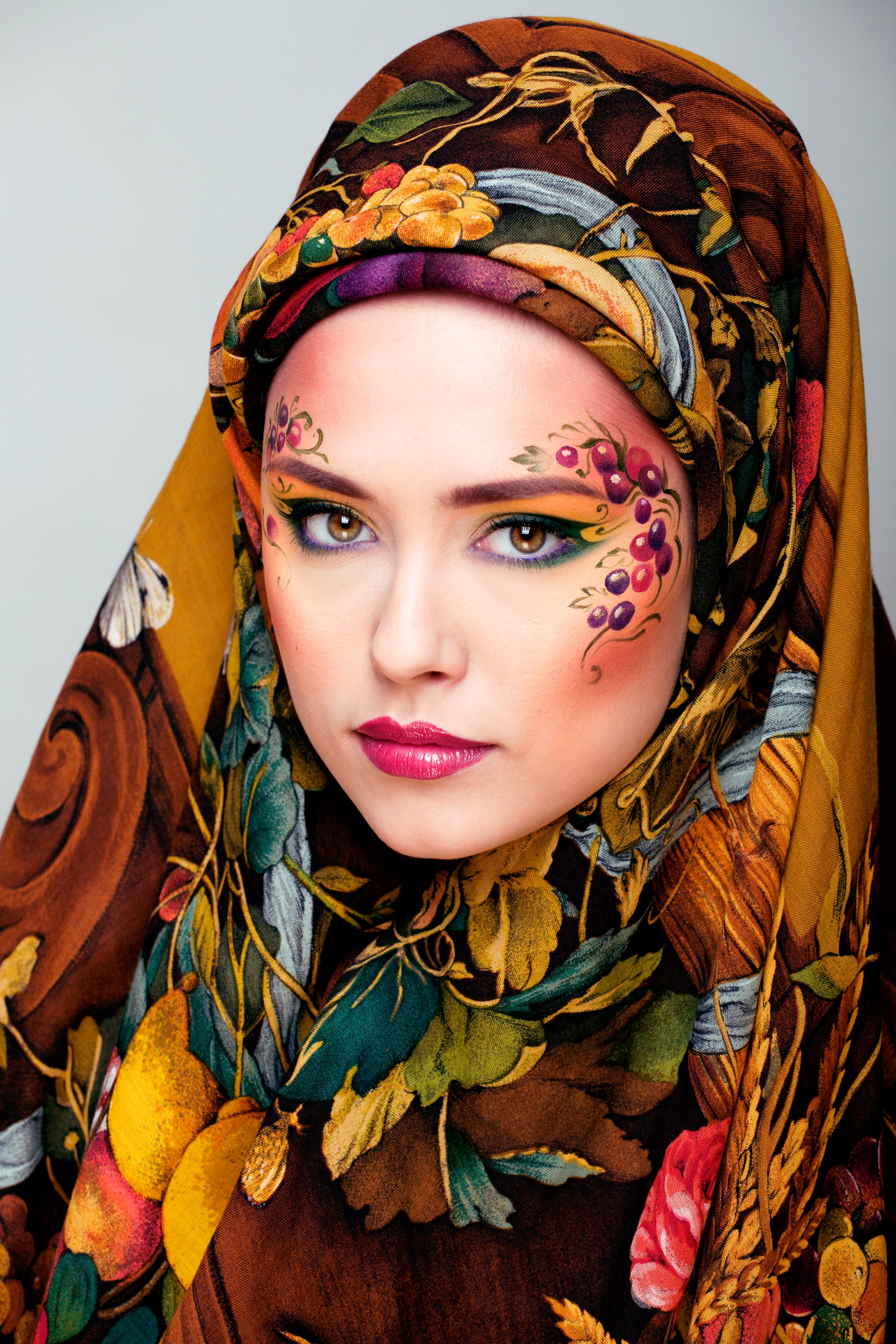 portrait of contemporary noblewoman with face art close up